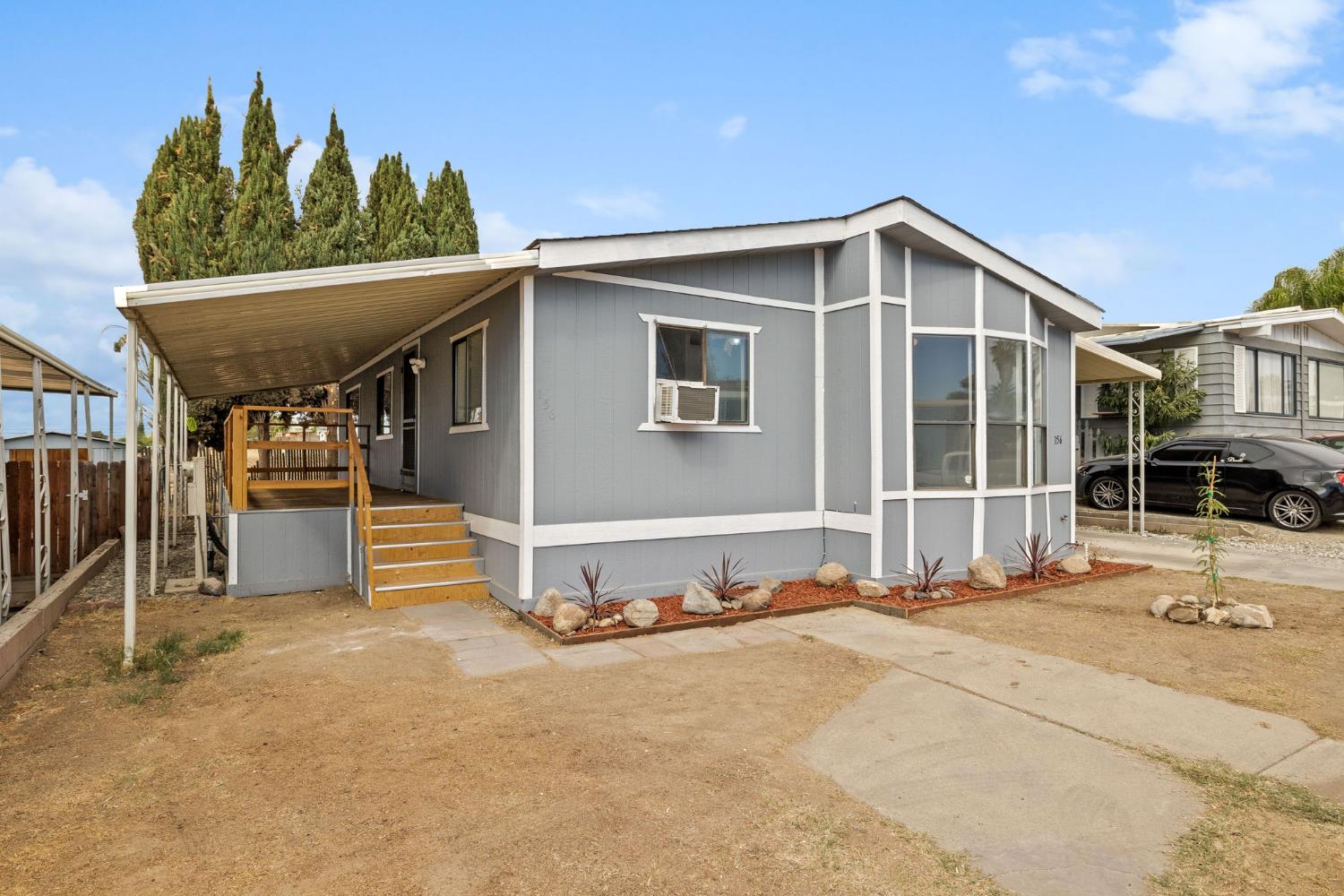 8300 Kern Canyon Road, Unit 156 Bakersfield, CA 93306 - Photo 39 of 40 a view of a house with a backyard