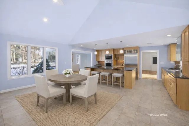 a kitchen with stainless steel appliances granite countertop a stove and a sink