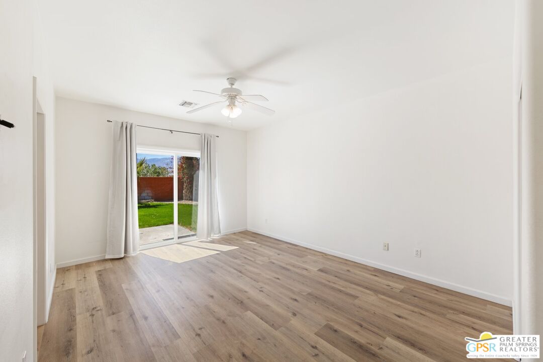 2885 East Sandia Road Palm Springs, CA 92262 - Photo 14 of 30 a view of an empty room with a window
