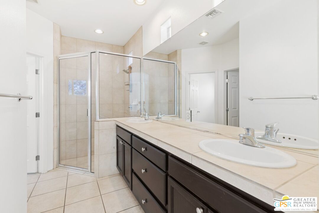 2885 East Sandia Road Palm Springs, CA 92262 - Photo 17 of 30 a bathroom with a double vanity sink mirror and double
