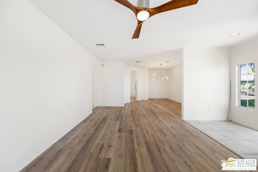 2885 East Sandia Road Palm Springs, CA 92262 - Photo 20 of 30 a view of empty room with wooden floor and fan