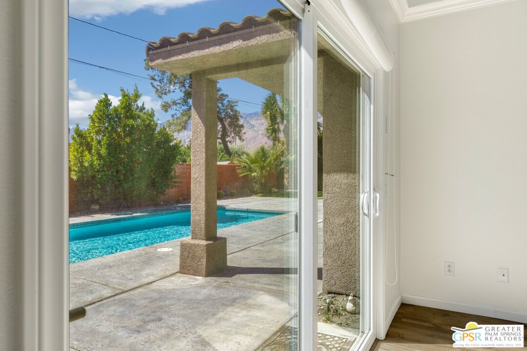 2885 East Sandia Road Palm Springs, CA 92262 - Photo 24 of 30 a front view of a house with garden
