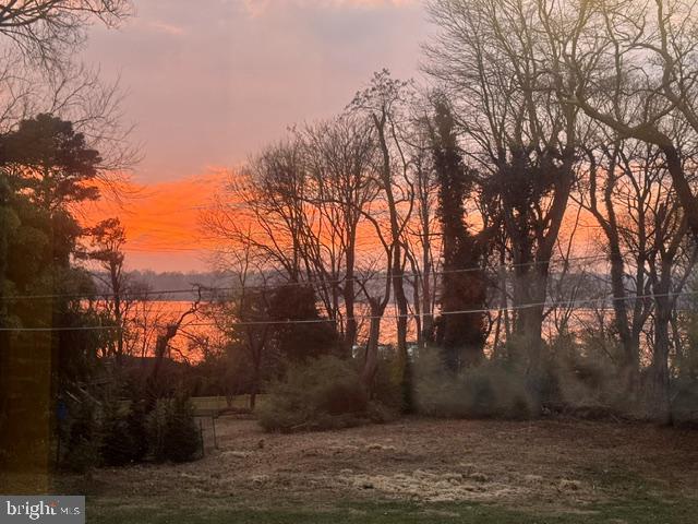 9219 Fort Foote Road Fort Washington, MD 20744 - Photo 66 of 68 Serene sunset over tranquil waters.