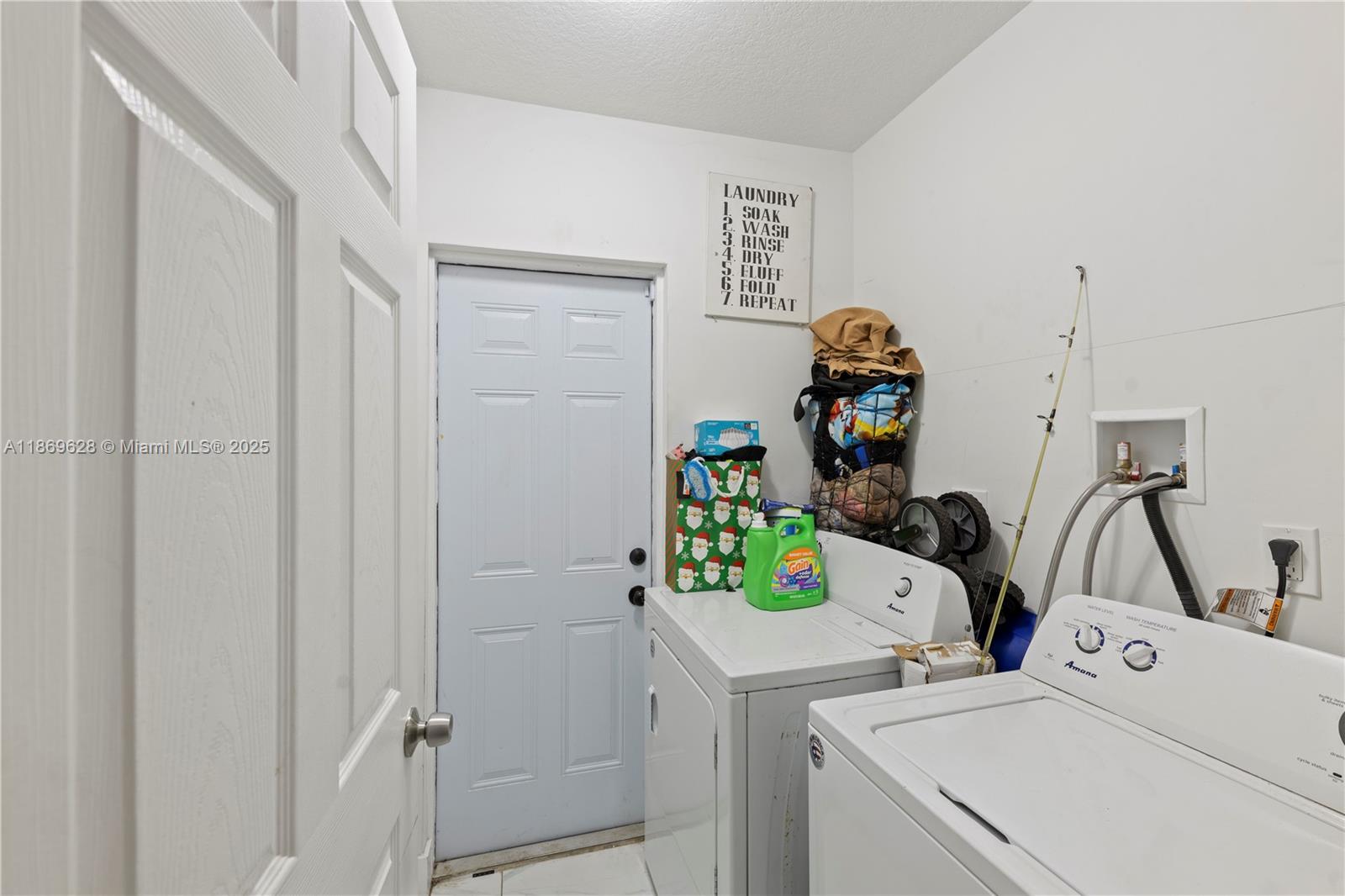 135 Northwest 6th Avenue Dania Beach, FL 33004 - Photo 18 of 26 a utility room with dryer and washer
