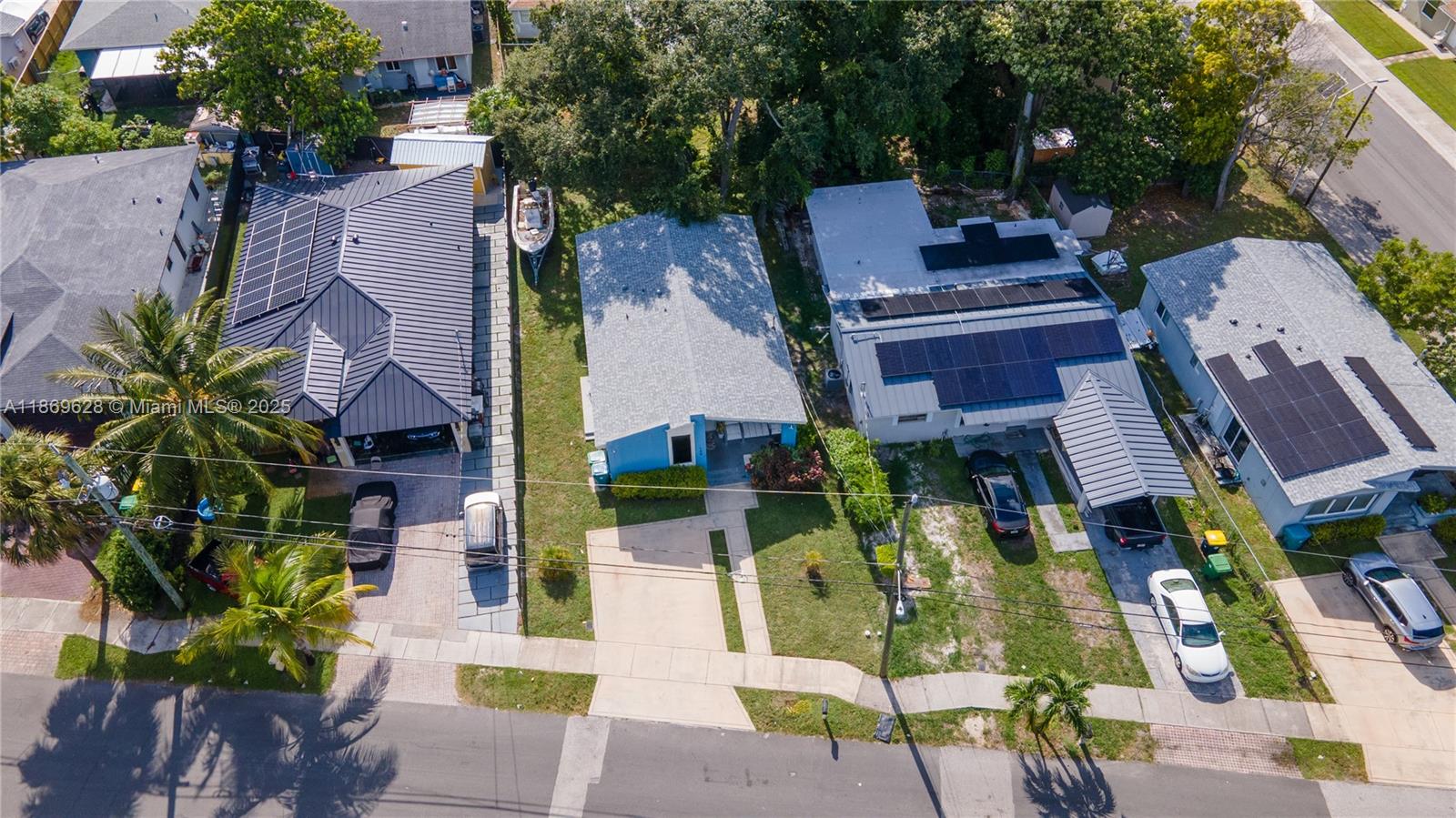 135 Northwest 6th Avenue Dania Beach, FL 33004 - Photo 26 of 26 an aerial view of multiple houses with yard