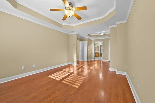 a spacious bathroom with a double vanity sink and a mirror