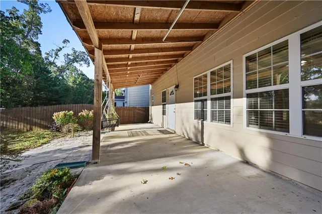 a view of backyard with barn