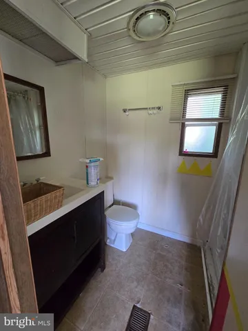 a room with furniture workspace and a window