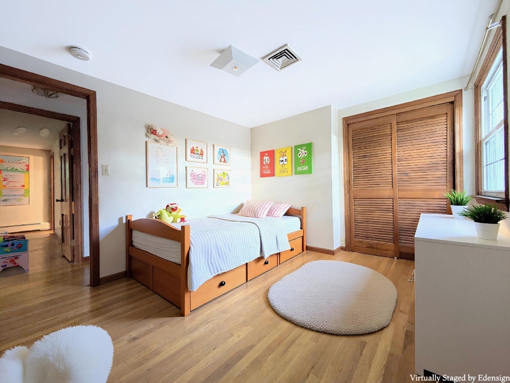 34 Leeds Terrace Lawrence, MA 01843 - Photo 12 of 27 a bed room with bed and a couch