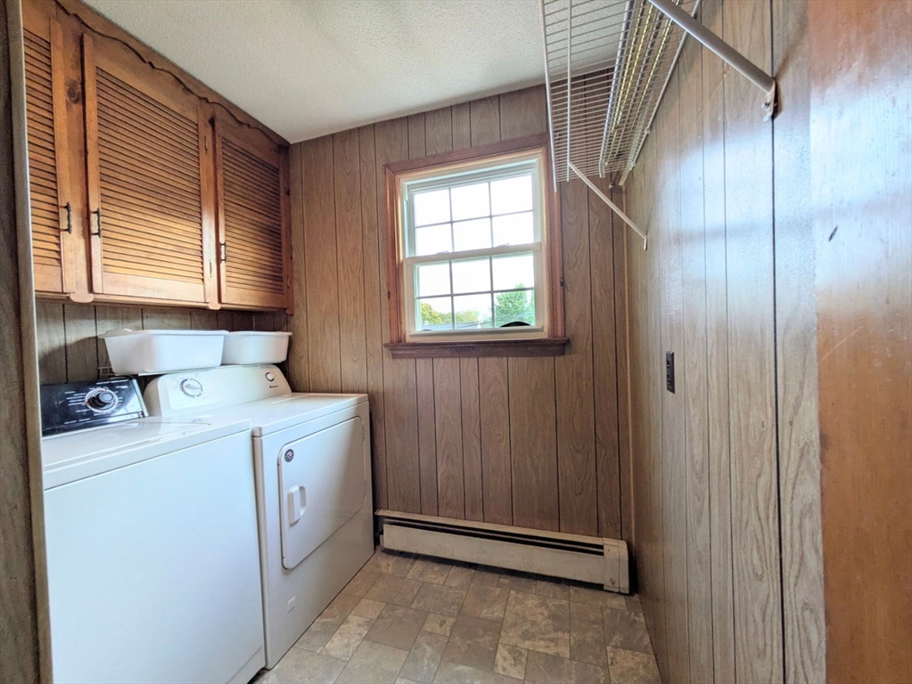 34 Leeds Terrace Lawrence, MA 01843 - Photo 15 of 27 a utility room with dryer and washer