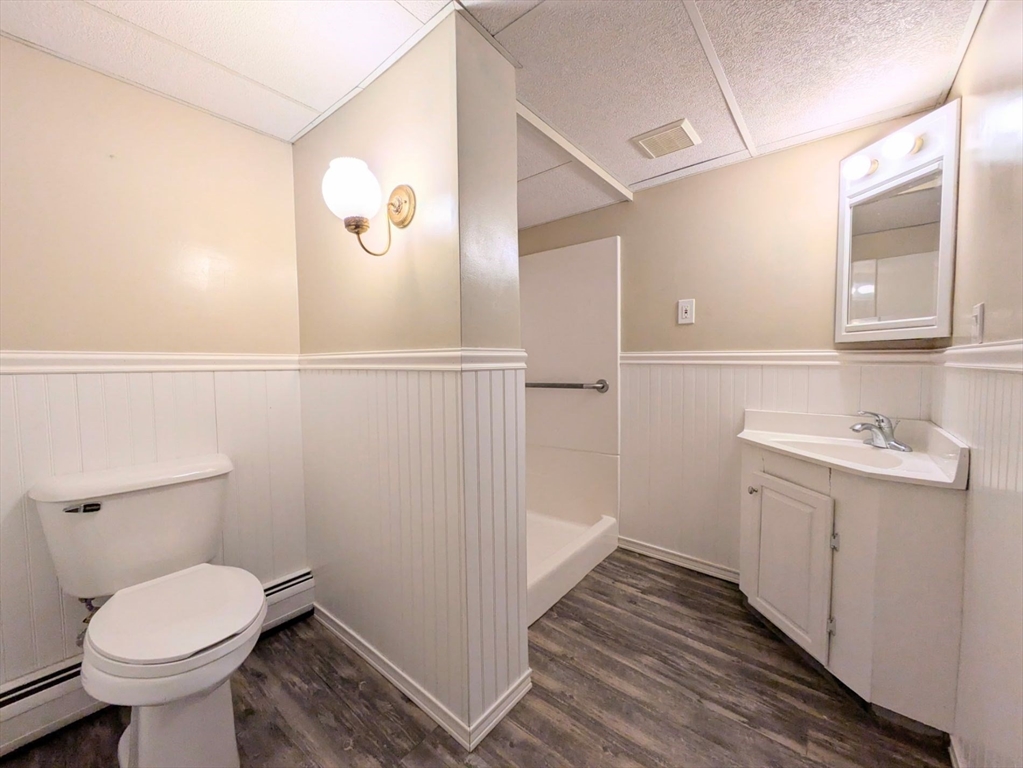 34 Leeds Terrace Lawrence, MA 01843 - Photo 26 of 27 a bathroom with a sink and mirror
