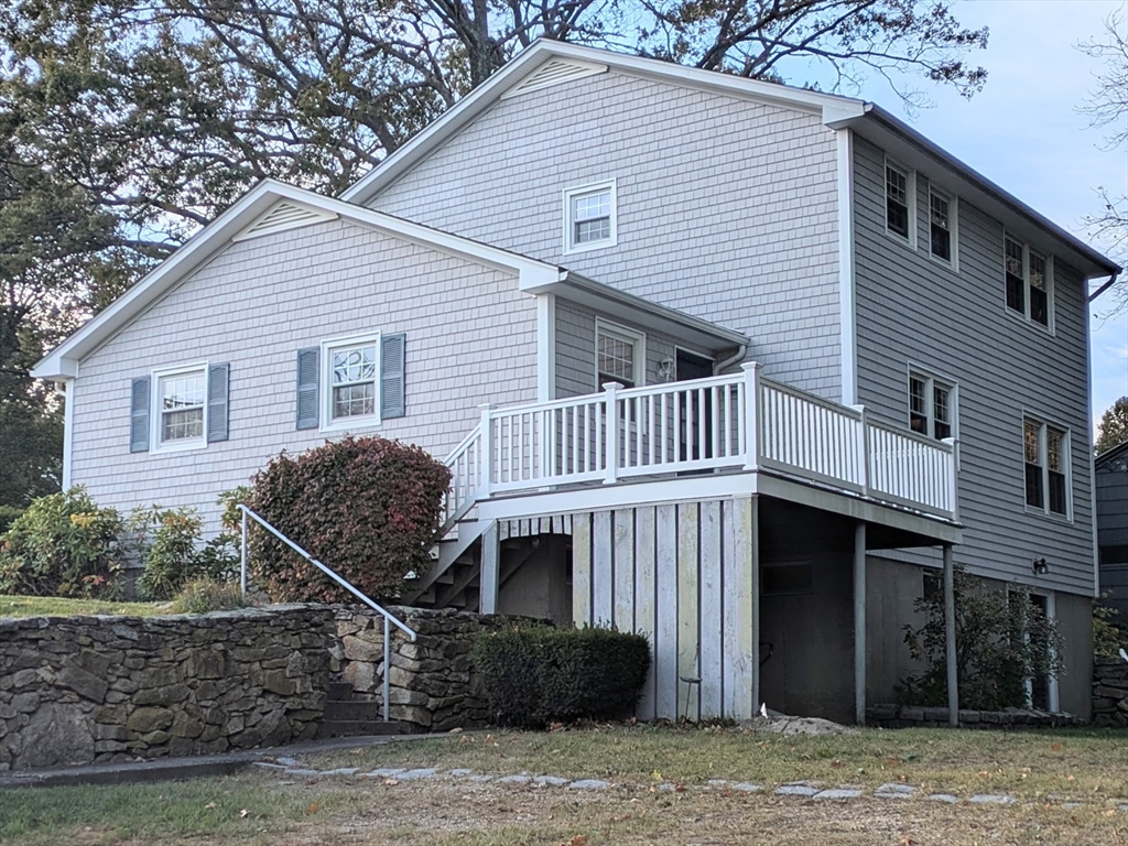 34 Leeds Terrace Lawrence, MA 01843 - Photo 3 of 27 a front view of a house with garage