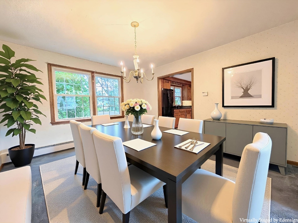 34 Leeds Terrace Lawrence, MA 01843 - Photo 7 of 27 a view of a dining room with furniture window and outside view