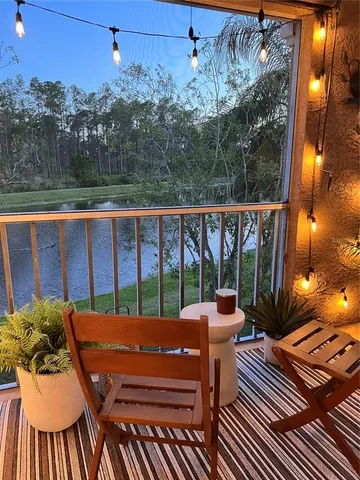 a view of a chairs and table in patio