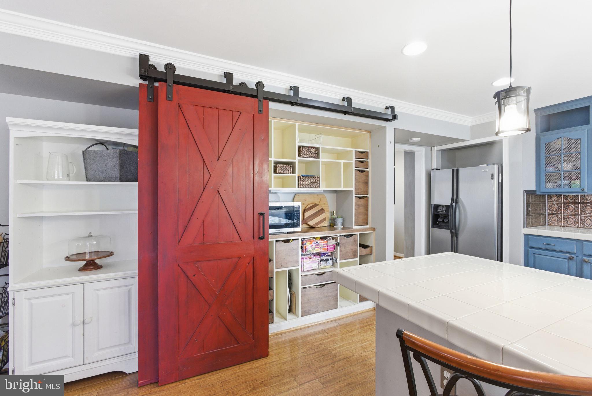 44913 Widgeon Place Callaway, MD 20620 - Photo 16 of 49 a kitchen with stainless steel appliances a refrigerator and cabinets
