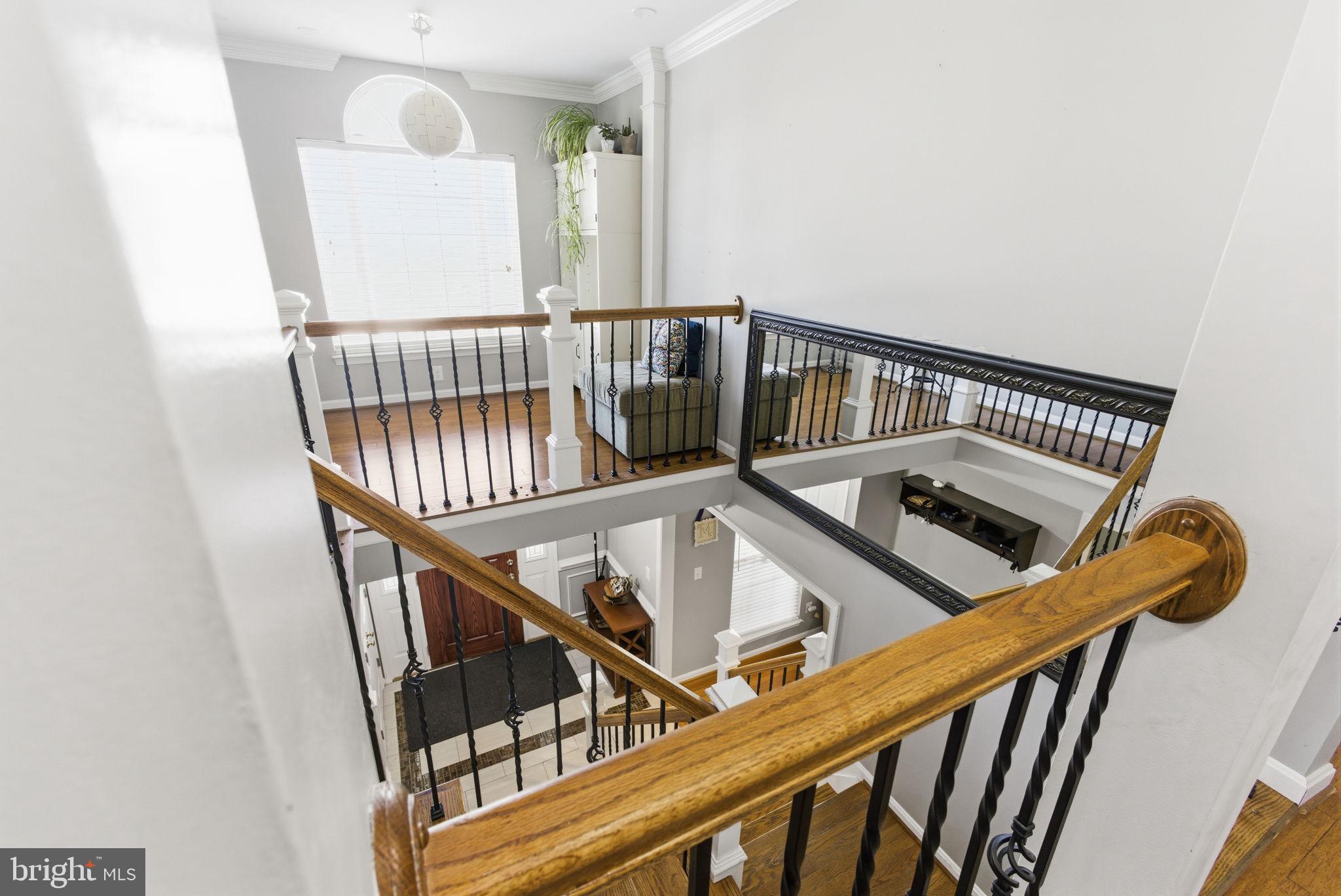 44913 Widgeon Place Callaway, MD 20620 - Photo 23 of 49 a view of staircase with railing and white walls