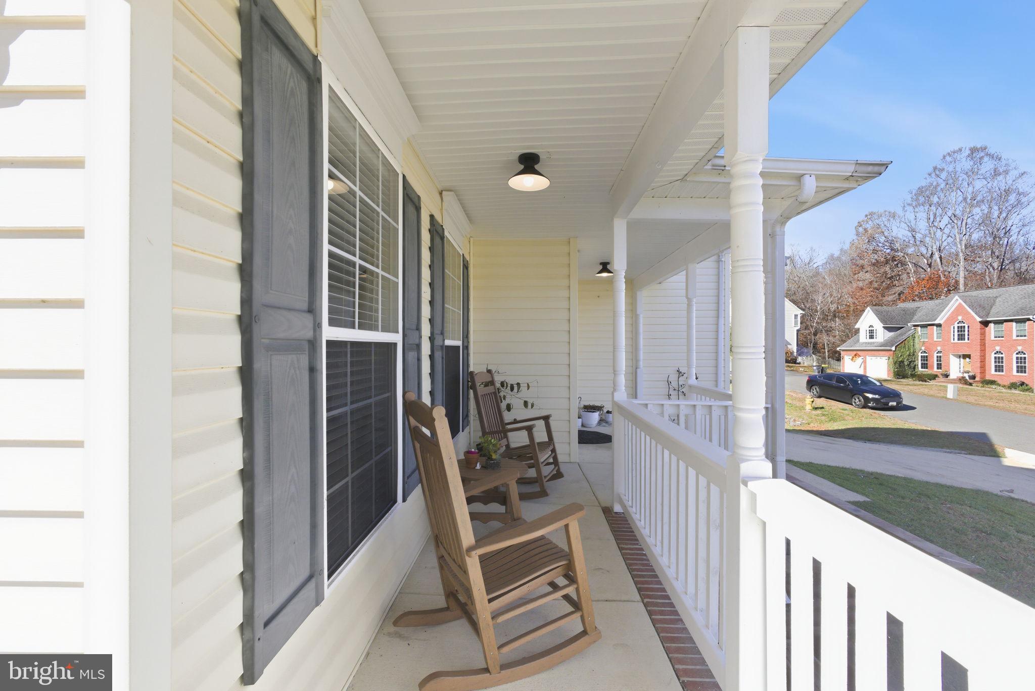 44913 Widgeon Place Callaway, MD 20620 - Photo 6 of 49 a view of a hallway with wooden floor and staircase