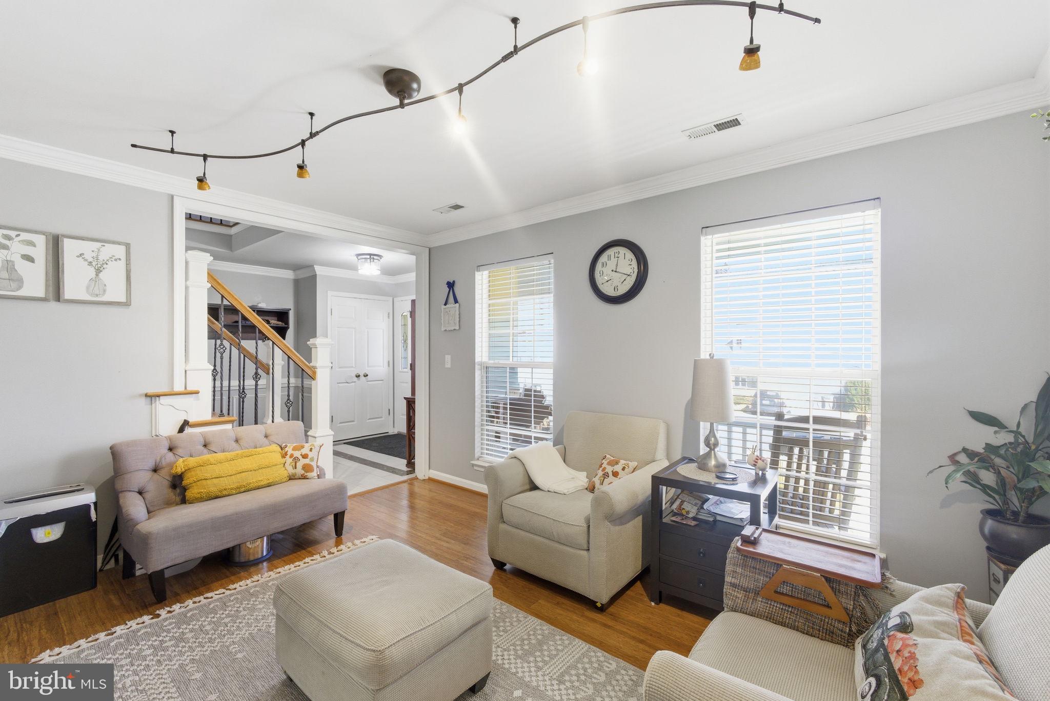 44913 Widgeon Place Callaway, MD 20620 - Photo 9 of 49 a living room with furniture and a large window