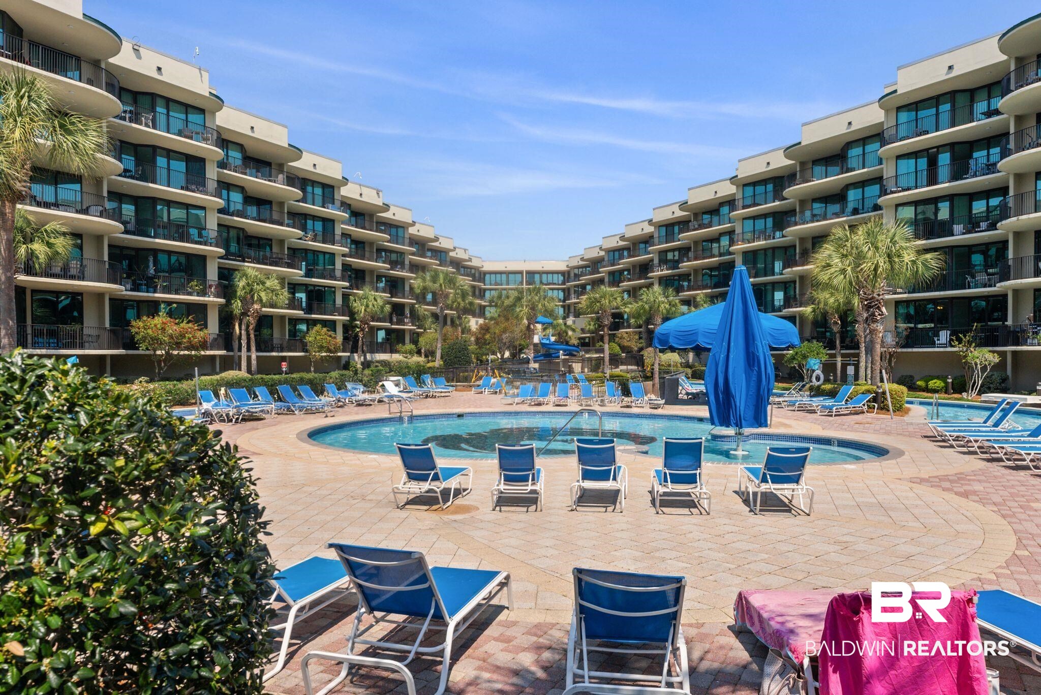 27580 Canal Road, Unit 1233 Orange Beach, AL 36561 - Photo 62 of 79 Community pool featuring a patio area