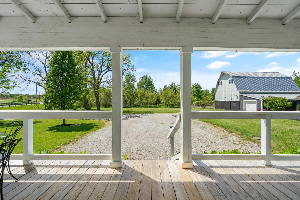2522 Bean-Oller Road Delaware, OH 43015 - Photo 4 of 93 Side porch entrance with barn/Milk house view