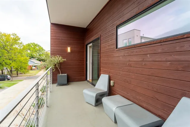a bathroom with a bathtub sink mirror and vanity