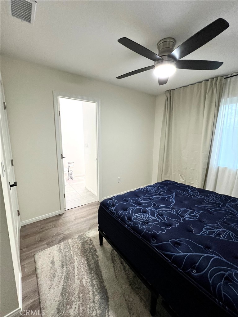 14080 Mohawk Road Apple Valley, CA 92307 - Photo 6 of 10 Primary bedroom with primary bathroom