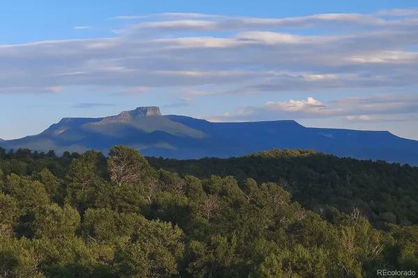 a view of sunset and mountains