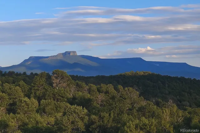 a view of sunset and mountains