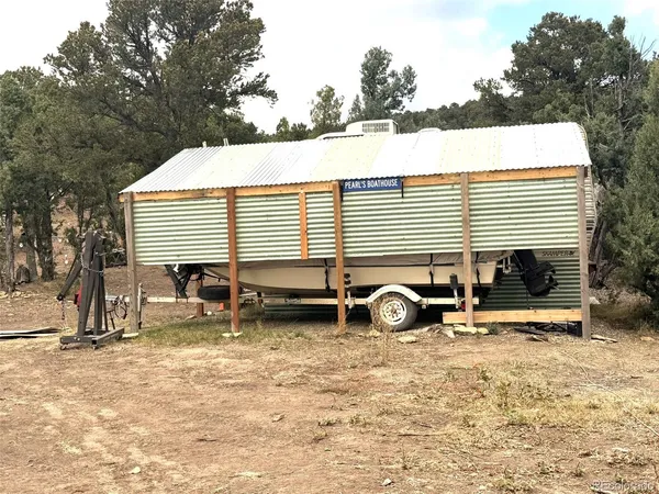 a sign board on the side of a road
