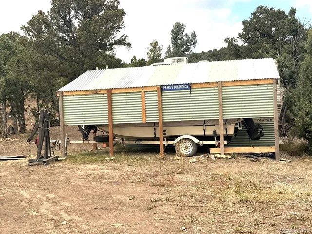 a sign board on the side of a road