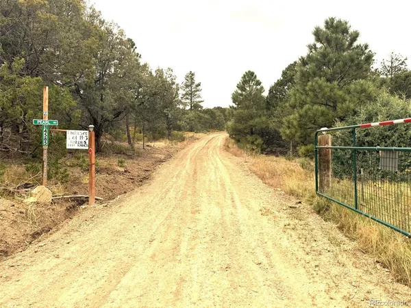 a view of swimming pool with outdoor seating