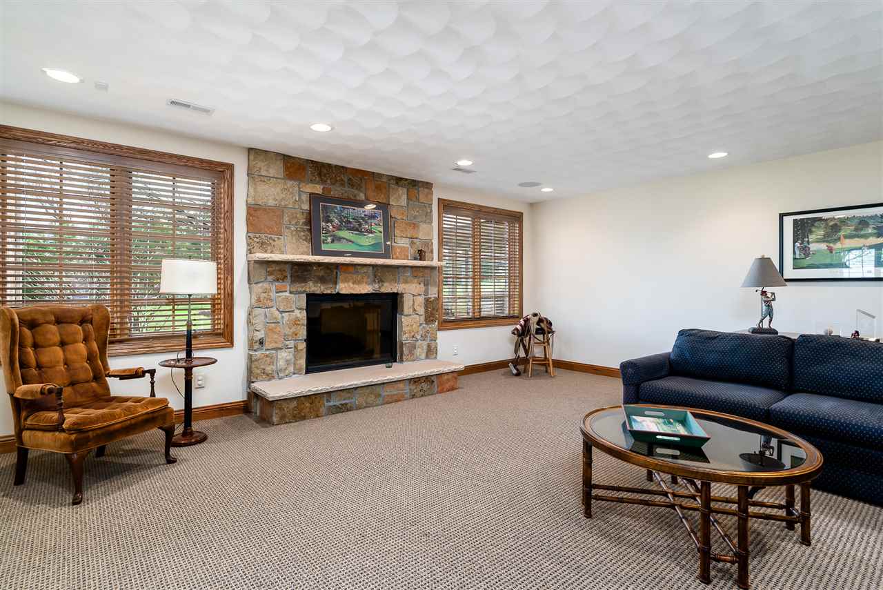 887 Timber Ridge Trail Rockford, IL 61114 - Photo 5 of 6 a living room with furniture and a fireplace