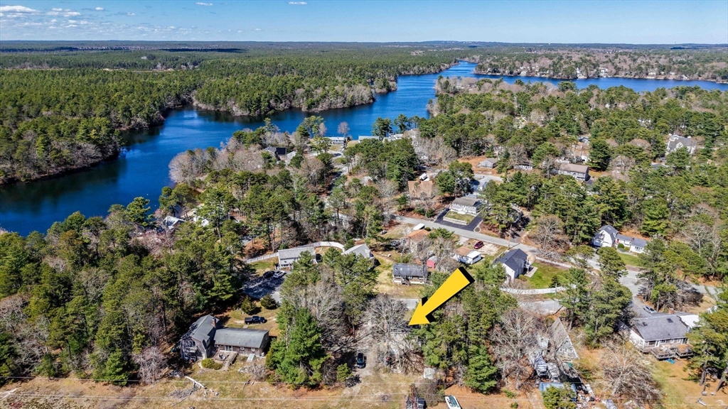 13 Albatross Avenue Wareham, MA 02538 - Photo 2 of 25 an aerial view of a house with a garden and lake view