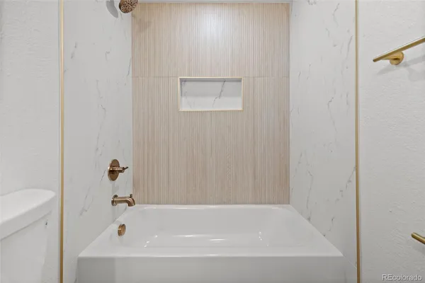 a bathroom with a bathtub