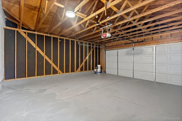 a view of an empty room with stairs