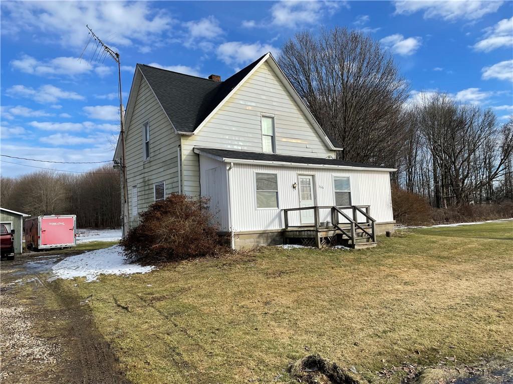 366 Stevenson Road Greenville, PA 16125 - Photo 1 of 14 a view of a house with backyard and trees