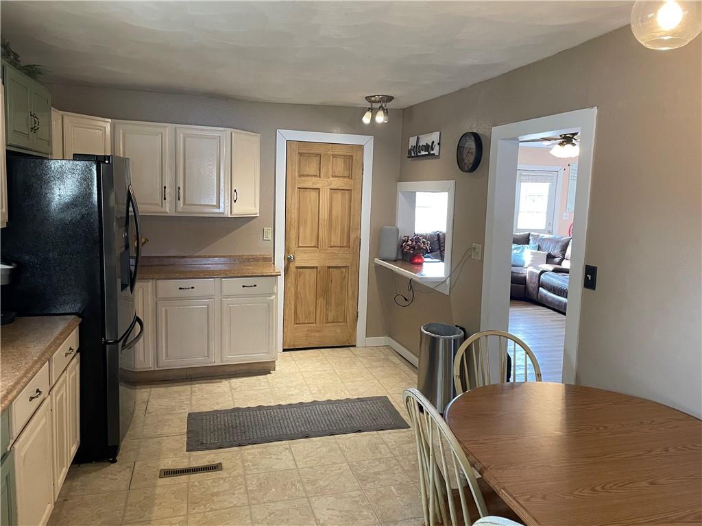 366 Stevenson Road Greenville, PA 16125 - Photo 11 of 14 a kitchen with stainless steel appliances granite countertop a refrigerator a stove and a sink with granite countertops