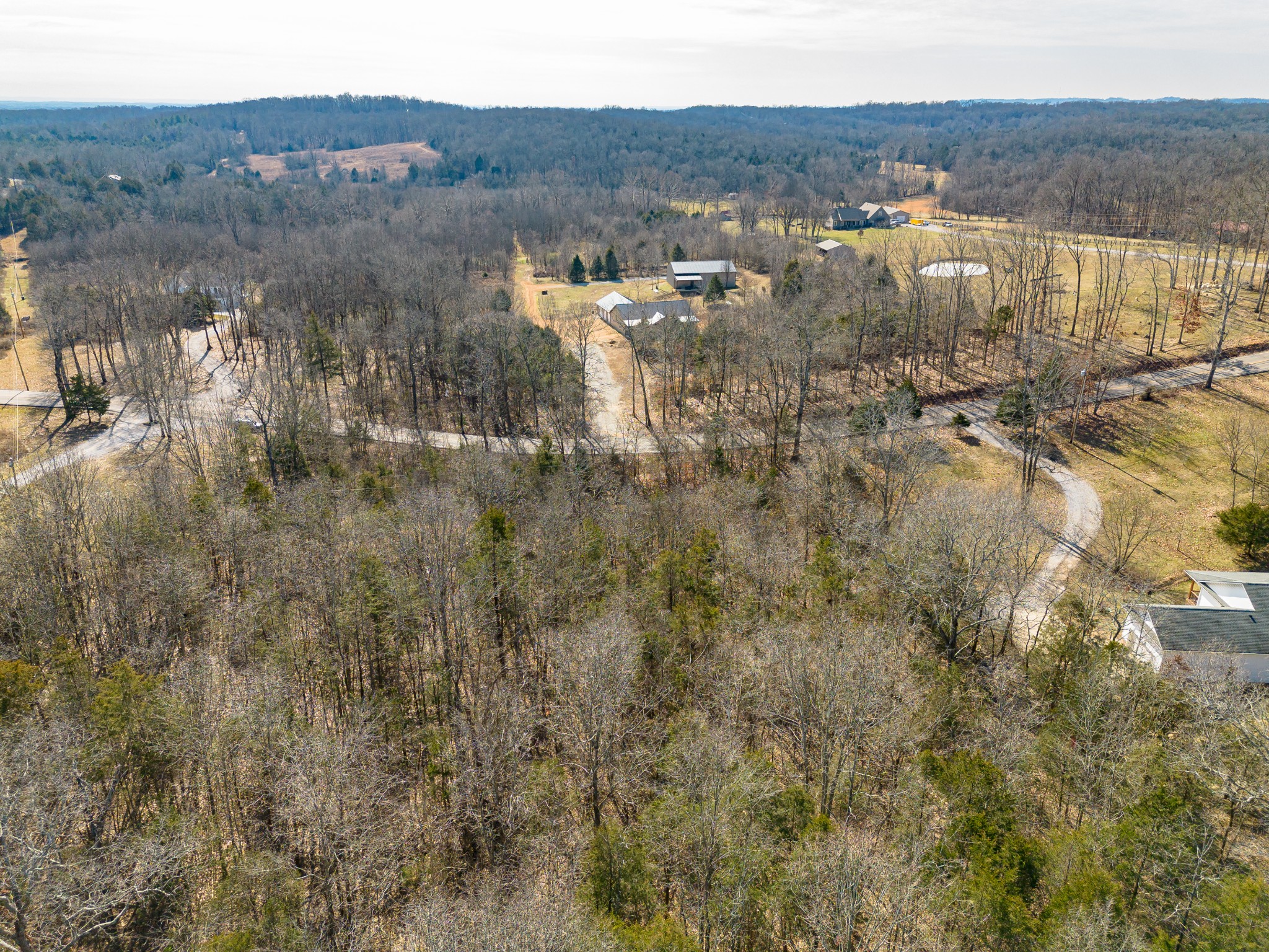0 Joe Peay Road Spring Hill, TN 37174 - Photo 8 of 29 a view of a lake with mountains in the background