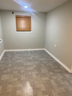 6827 South Green Street Chicago, IL 60621 - Photo 12 of 24 a view of an empty room with a window
