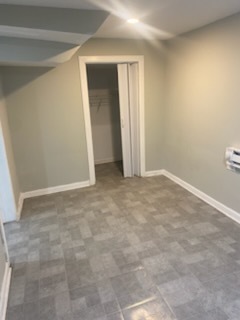 6827 South Green Street Chicago, IL 60621 - Photo 14 of 24 an empty room with closet