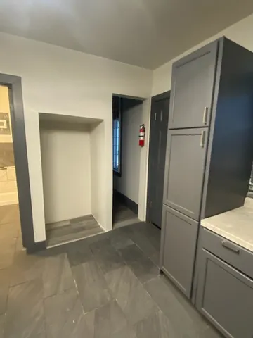 a view of a hallway with entryway