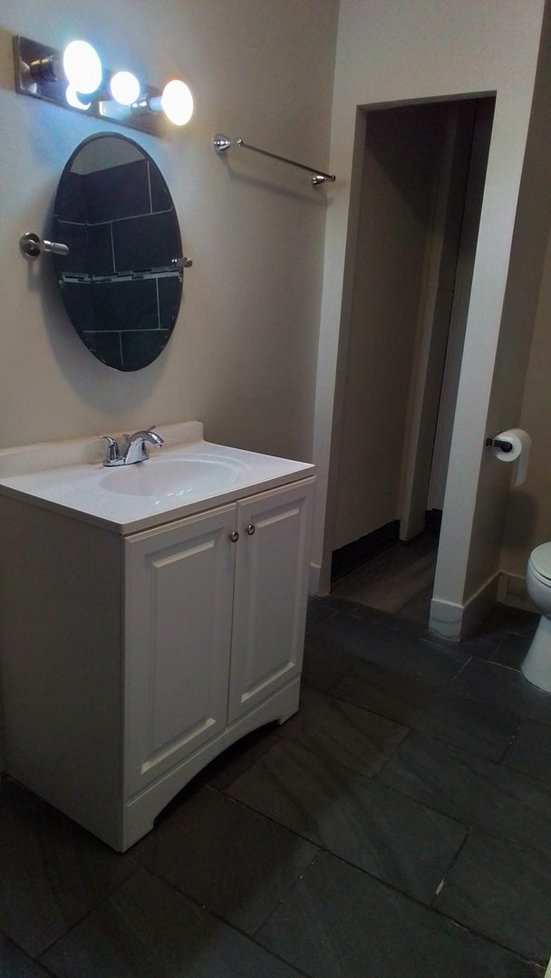 6827 South Green Street Chicago, IL 60621 - Photo 8 of 24 a view of a hallway