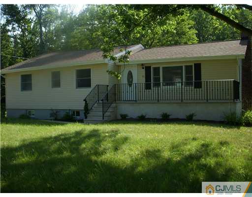61 Major Road Monmouth Junction, NJ 08852 - Photo 1 of 12 a view of a house with a yard