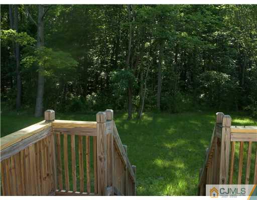 61 Major Road Monmouth Junction, NJ 08852 - Photo 11 of 12 a view of deck with furniture and garden