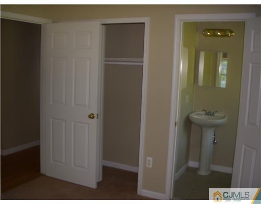 61 Major Road Monmouth Junction, NJ 08852 - Photo 7 of 12 a bathroom with a sink