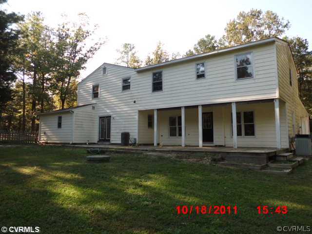 12309 Crumpland Road Chesterfield, VA 23832 - Photo 3 of 12 a front view of a house with a yard