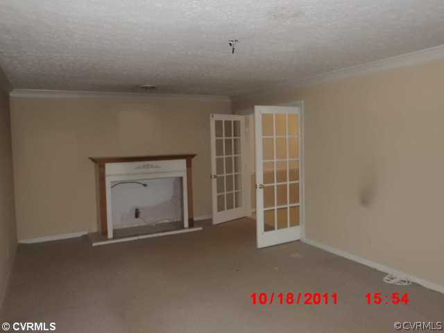 12309 Crumpland Road Chesterfield, VA 23832 - Photo 8 of 12 a view of an empty room with a window