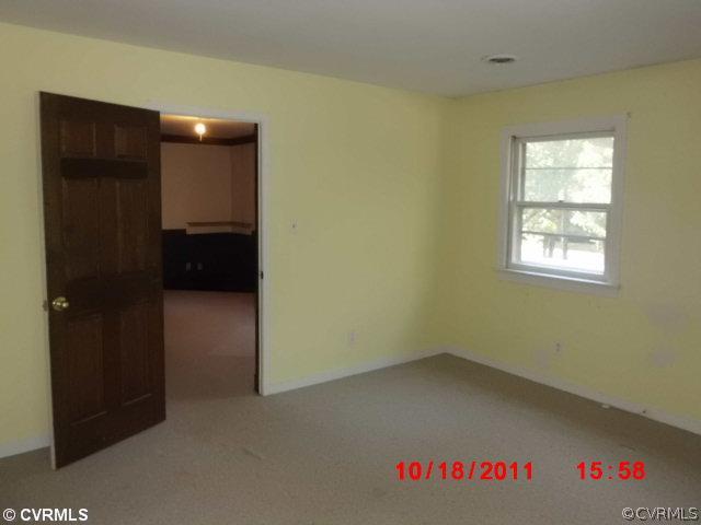 12309 Crumpland Road Chesterfield, VA 23832 - Photo 10 of 12 wooden floor in an empty room