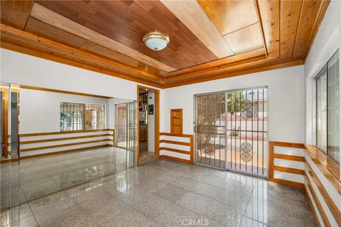 a view of front door with outdoor seating
