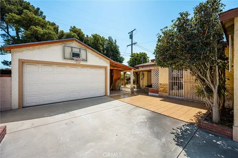 a front view of a house with a garage
